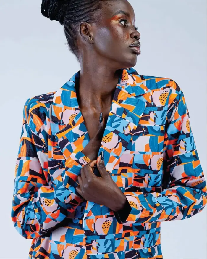 Portrait in colorful patterned jacket